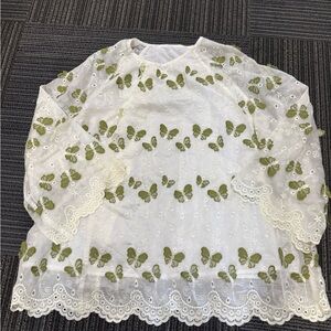 Chic Lace Top with Green Butterfly Design